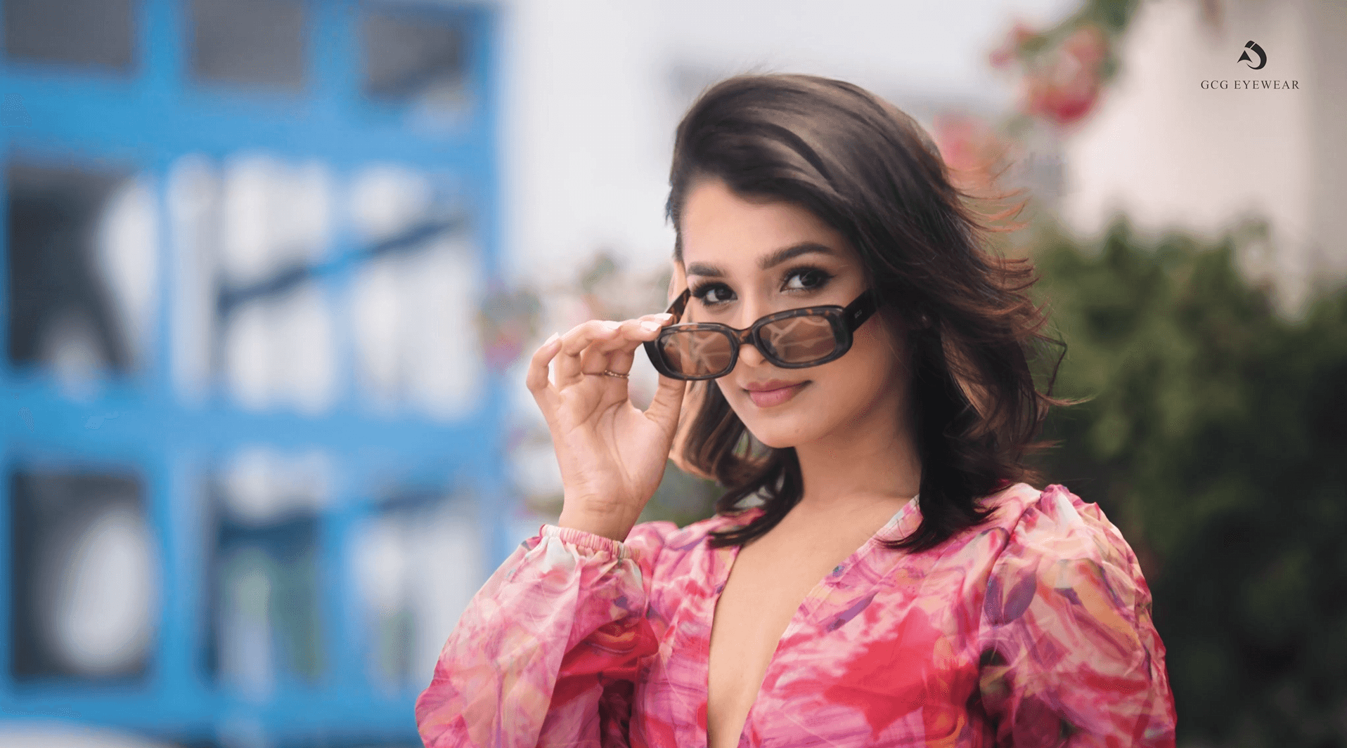 Two girls wearing one eyewear brand