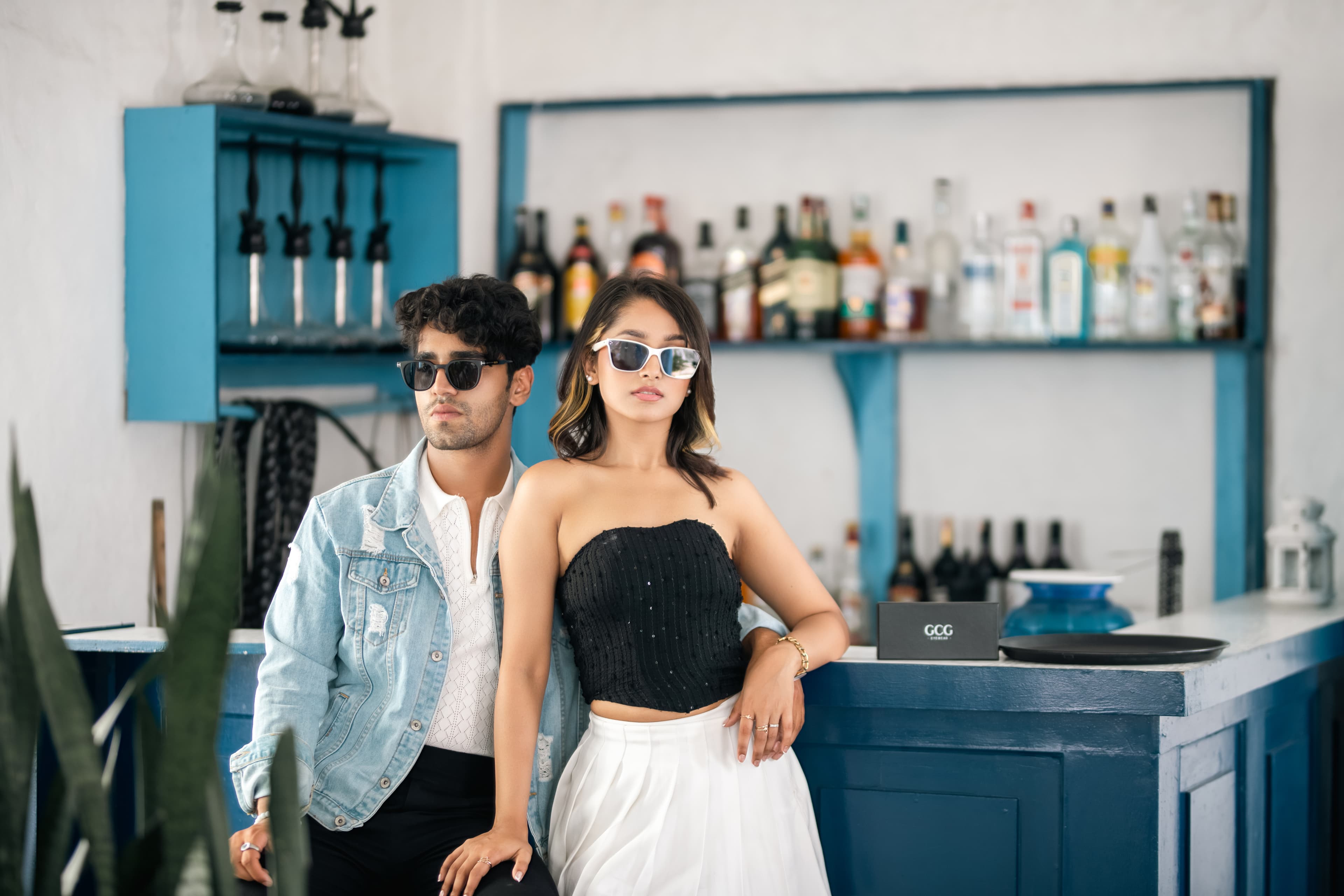 Two girls wearing one eyewear brand